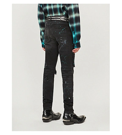 Shop Amiri Paint-splattered Skinny Jeans In Aged Black