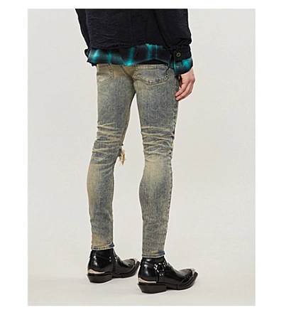 Shop Amiri Distressed Skinny Jeans In Dirty+indigo