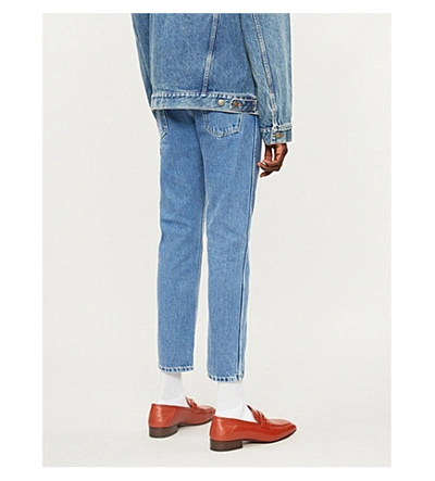Shop Gucci Applique-embellished Tapered Jeans In Blue Multi