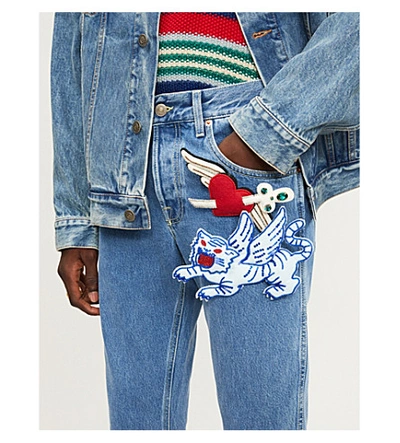 Shop Gucci Applique-embellished Tapered Jeans In Blue Multi