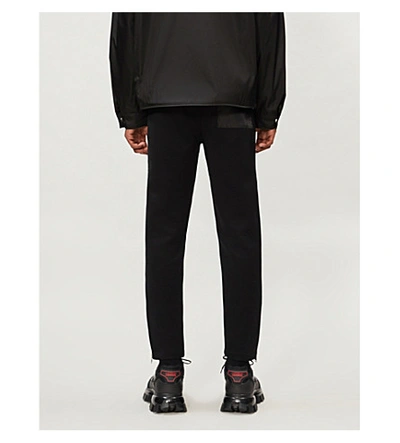 Shop Prada Contrast-panel Nylon And Cotton-blend Jogging Bottoms In Black