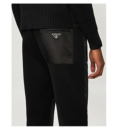 Shop Prada Contrast-panel Nylon And Cotton-blend Jogging Bottoms In Black