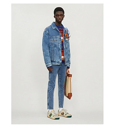 Shop Gucci Appliquéd Faded Denim Jacket In Blue Multi