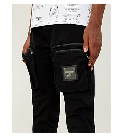 Shop Boy London Patch-pocket Slim-fit Tapered Stretch-cotton Trousers In Black