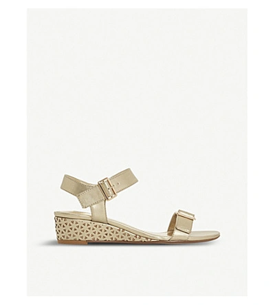 Shop Dune Karinaa Laser Cut Metallic Wedge Sandals In Gold