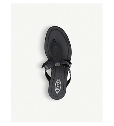Shop Tod's Bow-front Logo-embossed Leather Sandals In Black