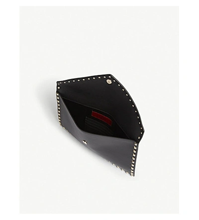 Shop Valentino Rockstud Grained Leather Envelope Clutch In Black