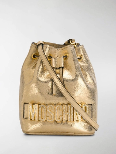 Shop Moschino Laminated Bucket Bag In Gold