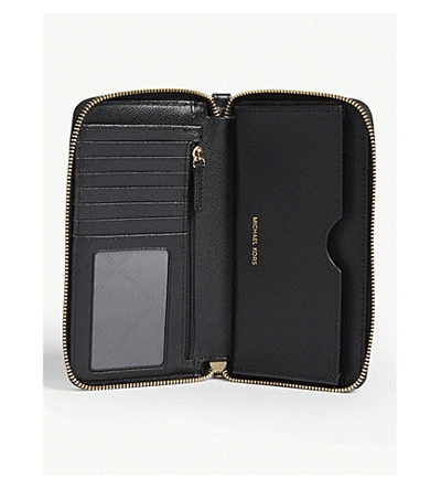 Shop Michael Michael Kors Leather Travel Phone Case In Black