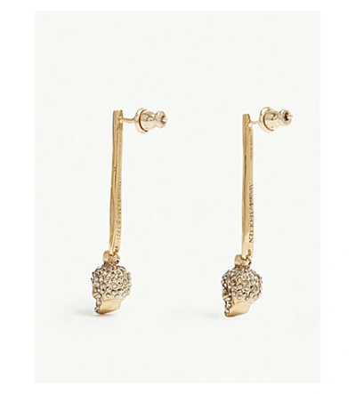 Shop Alexander Mcqueen Stick Skull Earrings In Silver Mix