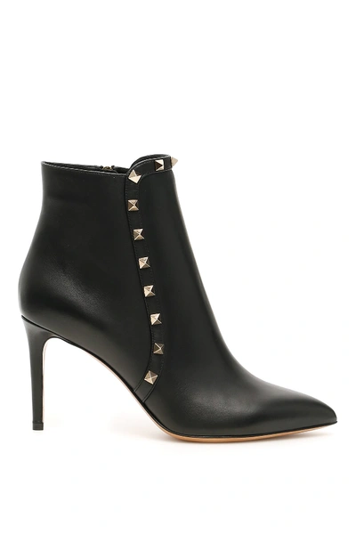 Shop Valentino Rockstud Ankle Boots In Nero (black)