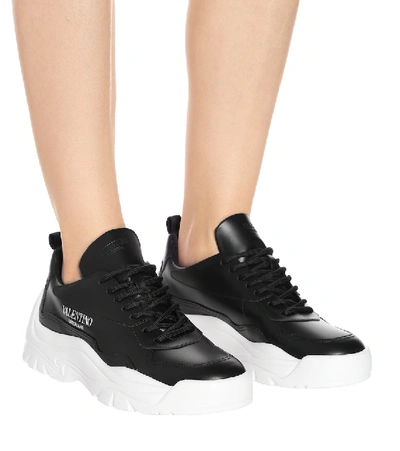 Shop Valentino Gumboy Leather Sneakers In Black