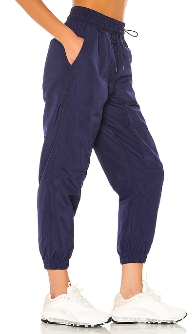 Shop Nike Nsw Tech Pack Woven Pant In Blackened Blue
