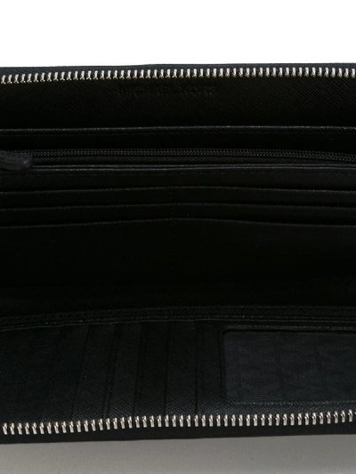 Shop Michael Michael Kors Leather Travel Continental Wallet In Black