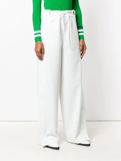 Shop Valentino Wide Leg Trousers With Buttons In White