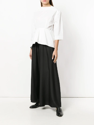 Shop The Row Flared Trousers In Black