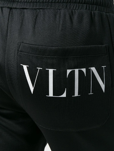 Shop Valentino Vltn Trousers In Black