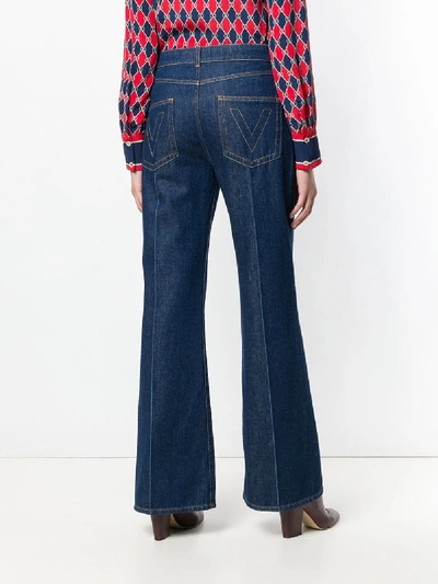 Shop Valentino Cotton Flare Denim Jeans In Blue