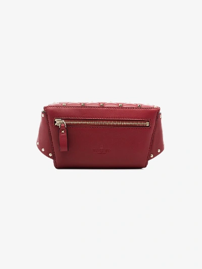 Shop Valentino Rockstud Spike Leather Belt Bag In Red