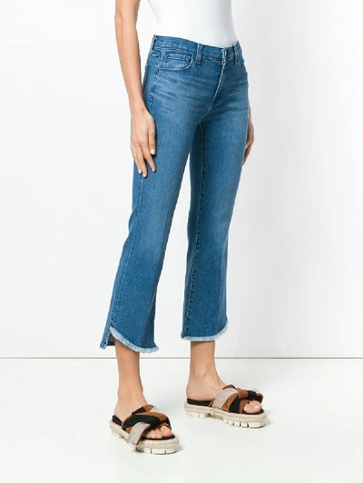 Shop J Brand Mid Rise Cropped Bootcut Selena Jeans In Blue