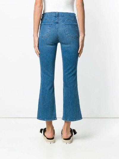 Shop J Brand Mid Rise Cropped Bootcut Selena Jeans In Blue