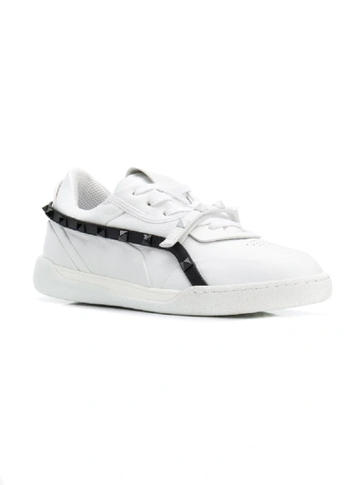 Shop Valentino Rockstud Armor Leather Sneakers