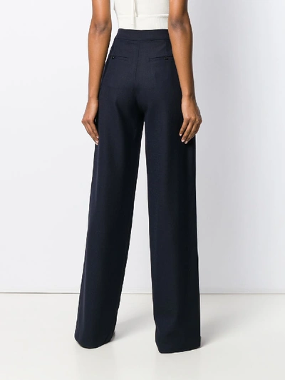 Shop Jacquemus High-rise Wool Trousers In Blue