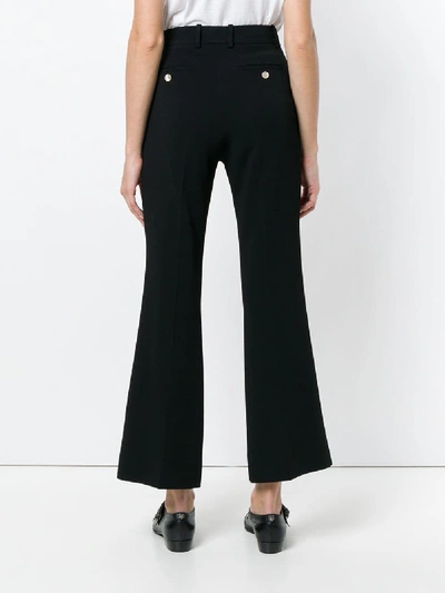 Shop Gucci Cropped Bootcut Trousers In Black