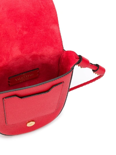 Shop Valentino Vee Ring Small Leather Saddle Bag In Red
