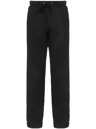 Shop Valentino Vltn Print Trousers In Black