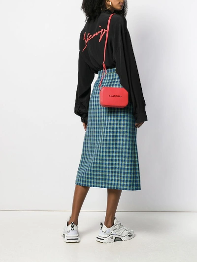 Shop Balenciaga Everyday Xs Crossbody Bag In Red