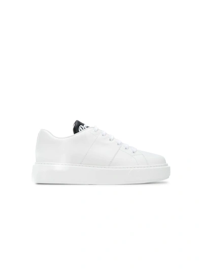 Shop Prada Leather Sneakers In White