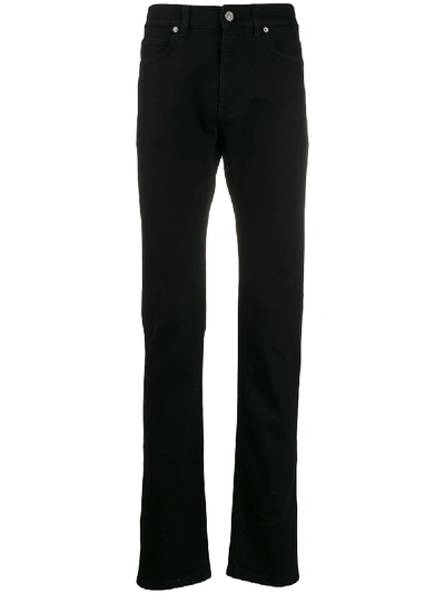 Shop Versace Classic Jeans In Black