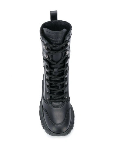 Shop Prada Leather Boots In Black