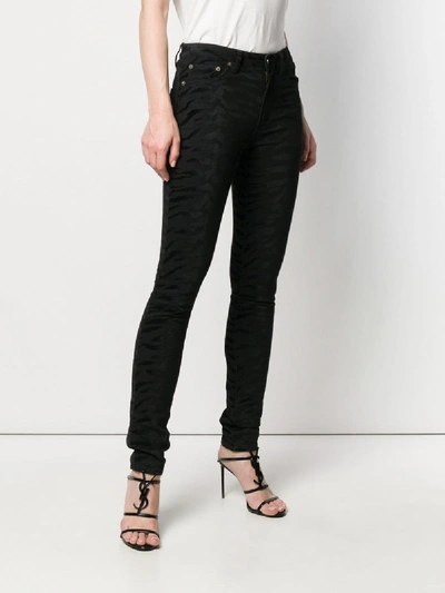 Shop Saint Laurent Cotton Jeans In Black