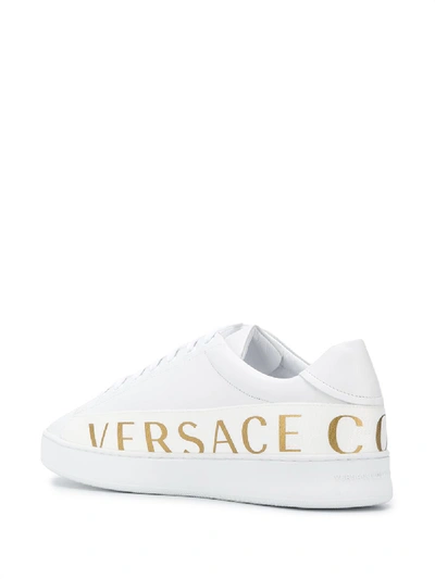 Shop Versace Logo Leather Sneakers In White