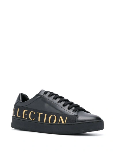 Shop Versace Logo Leather Sneakers In Black