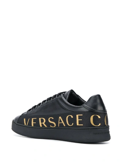 Shop Versace Logo Leather Sneakers In Black