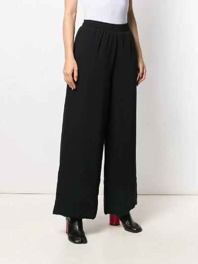 Shop Mm6 Maison Margiela Trousers In Black