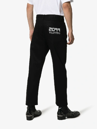 Shop Valentino 2099  Print Jeans In Black