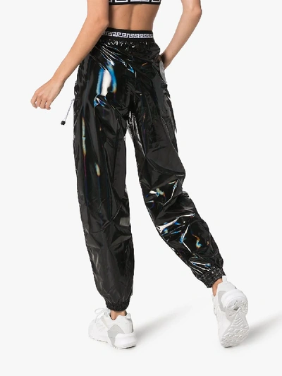 Shop Versace Holographic Track Trousers In 101 - Black