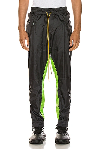 Shop Rhude Flight Suit Pant In Black,green In Black & Neon Green