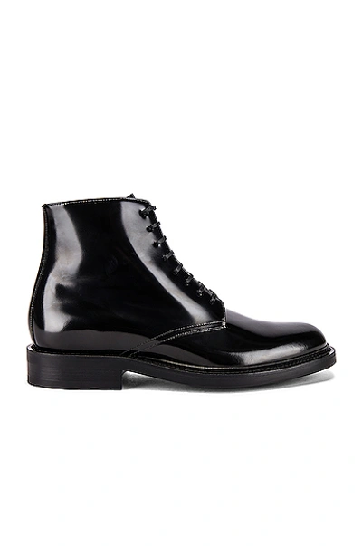 Shop Saint Laurent Army Lace Up Boots In Black