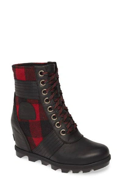 Shop Sorel Lexie Wedge Waterproof Boot In Dark Slate Leather