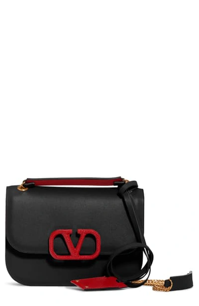 Shop Valentino Small Vlock Chain Calfskin Shoulder Bag - Black In Nero/ Rouge