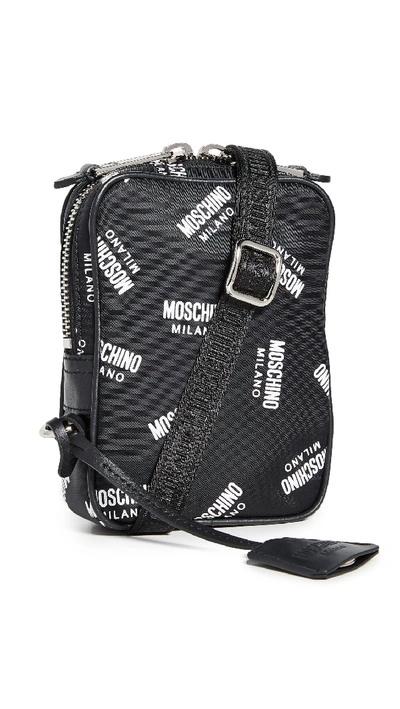 Shop Moschino Multi Logo Small Crossbody Bag In Black