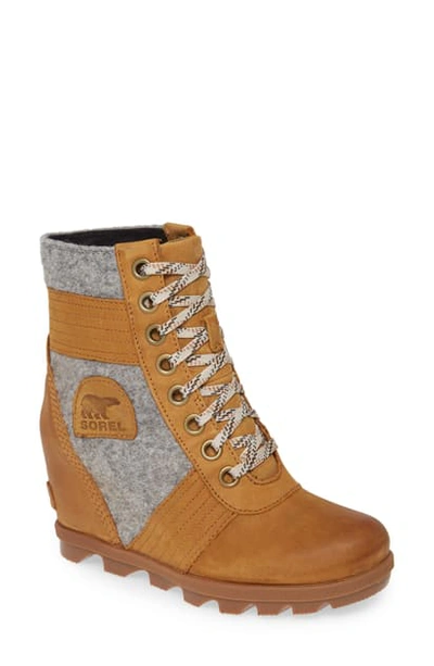 Shop Sorel Lexie Wedge Waterproof Boot In Camel Brown Leather
