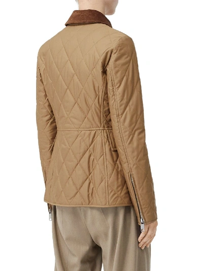 Shop Burberry Diamond-quilted Riding Jacket In Beige