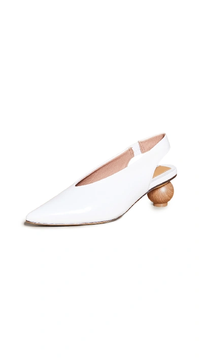 Shop Jaggar Spheric Point Toe Pumps In Ivory