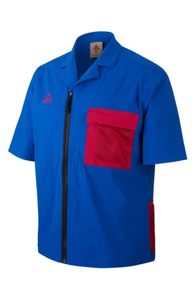 Shop Nike Acg Short Sleeve Zip-up Stretch Nylon Shirt In Game Royal/ Sport Fuchsia